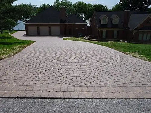 A beautiful driveway with brick pavers