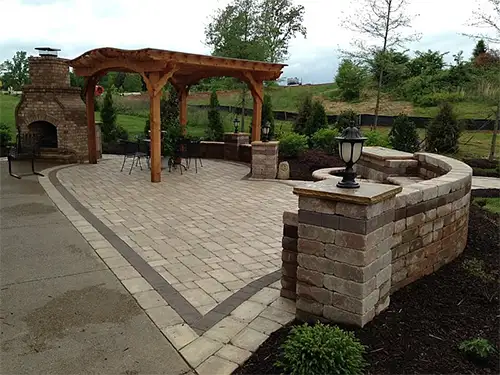 A nice new wood pergola over a backyard patio