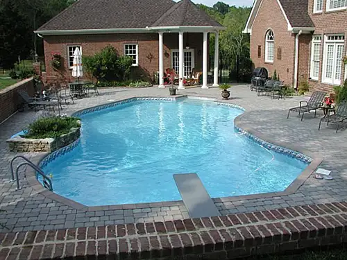 Another pool deck with pool coping.